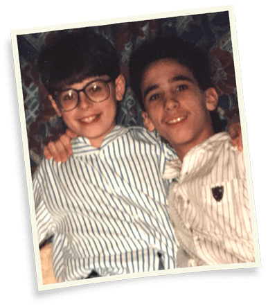 Murphy Panagiotou and Achilles Tzoulafis as childhood friends, growing up across the street from each other long before founding Infinity Energy