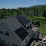 House with solar panels for solar tax credits blog
